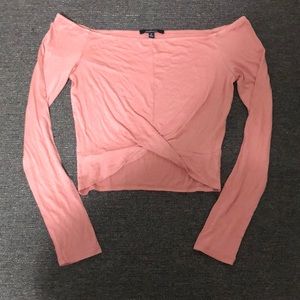 It’s a long sleeve peach/pink shirt. It’s brand new never worn.